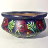 The clay pot or bowl is made by local potters and the Papermachie floral design is made by artist Jasia Nisar.