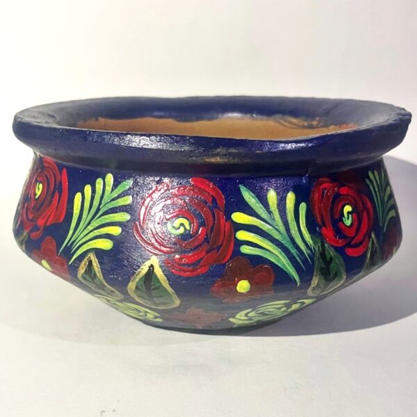Paper machie bowl 1 The clay pot or bowl is made by local potters and the Papermachie floral design is made by artist Jasia Nisar.